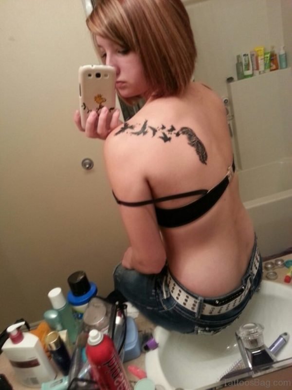Amazing Feather Tattoo On Back