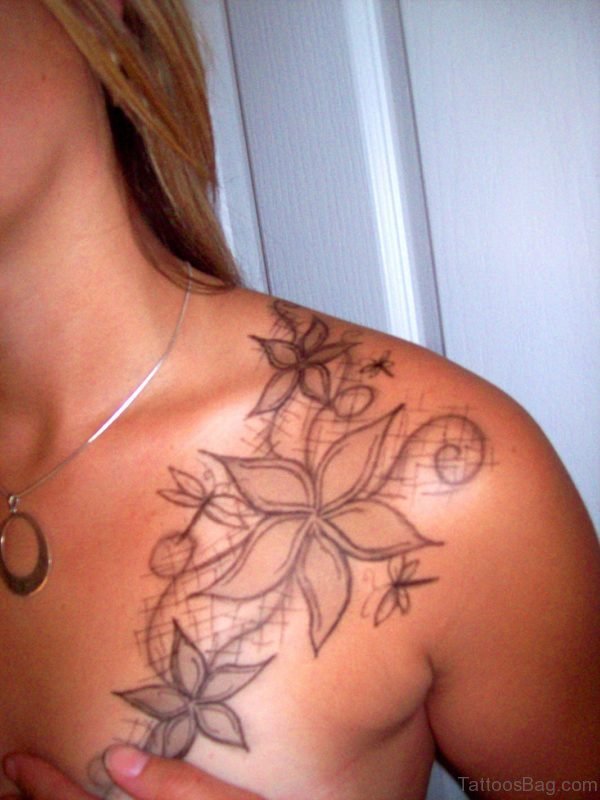 Amazing Lily Tattoo On Front Shoulder