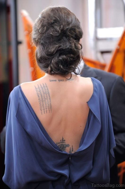 Awesome Wording Tattoo Design On Back