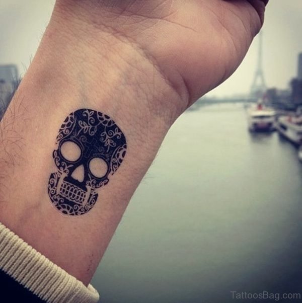 Awesome 2D Skull Tattoo On Wrist