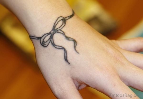 Bow Tattoo On Wrist
