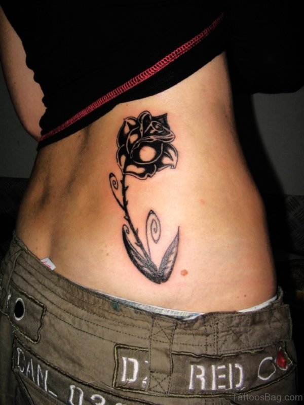 Black Rose Flower Tattoo On Lower Back