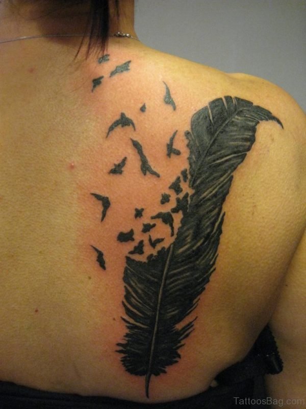 Bird Crow And Feather Tattoo On The Upper Back