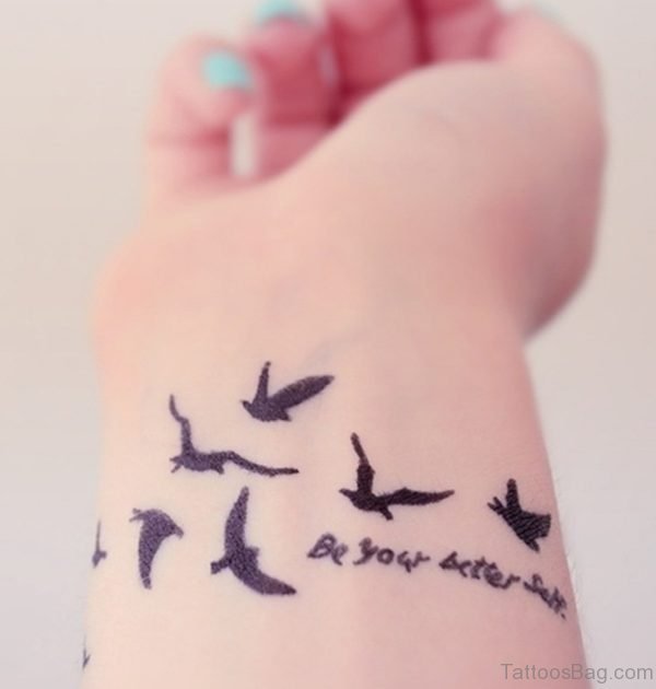 Birds And Wording Tattoo On Wrist