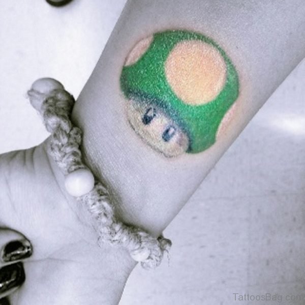 Black 1 Up Wrist Tattoo