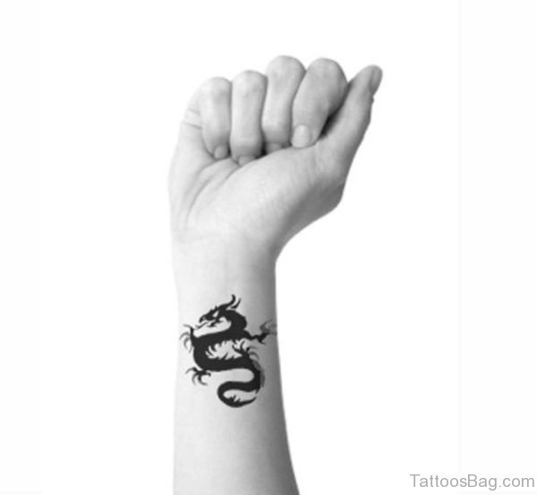 Black And White Dragon Wrist Tattoo