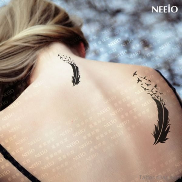 Black Bird And Feather Tattoo