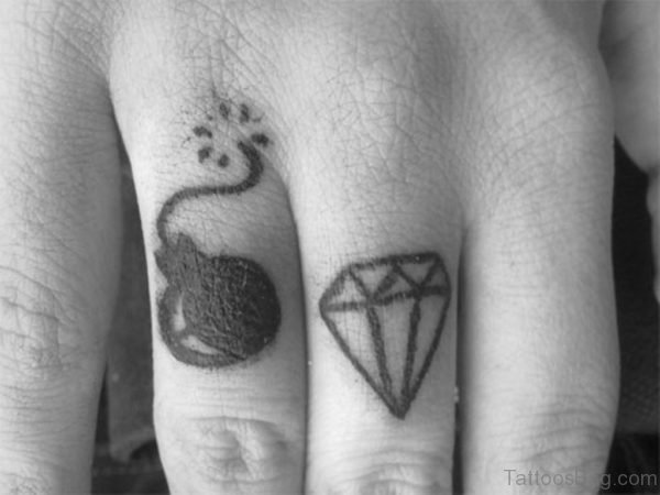 Black Diamond Tattoo On Finger
