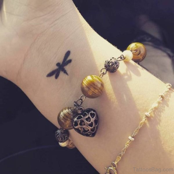 Black Dragonfly Tattoo On Wrist