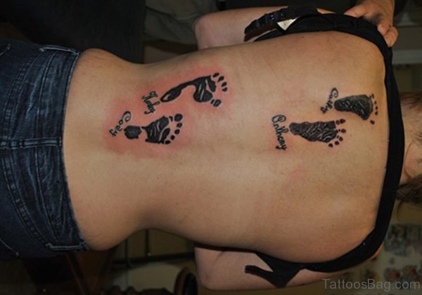 Black Footprint And Name Tattoo