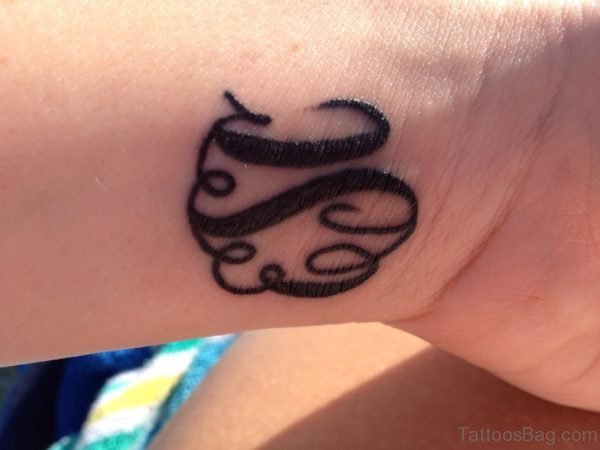 Black Initials Word Tattoo On Wrist