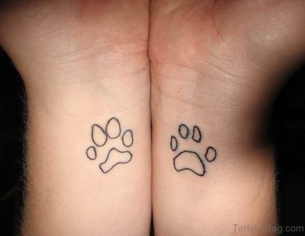 Outline Paw Tattoo On Wrist