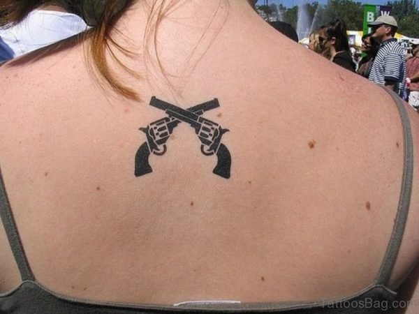 Two Crossing Gun Tattoo