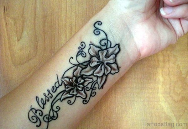 Blessed Flower Tattoo On Wrist
