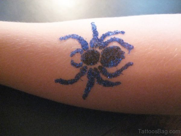 Blue Black Spider Wrist Tattoo