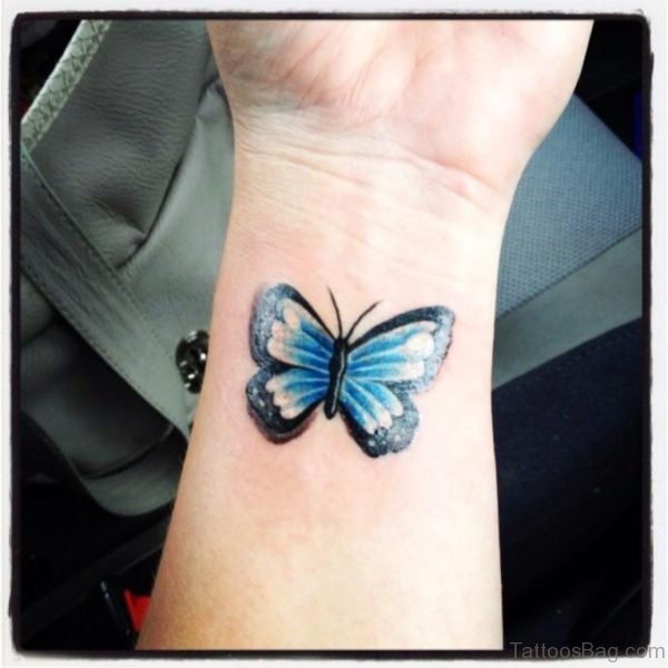 Blue Butterfly Tattoo On Wrist