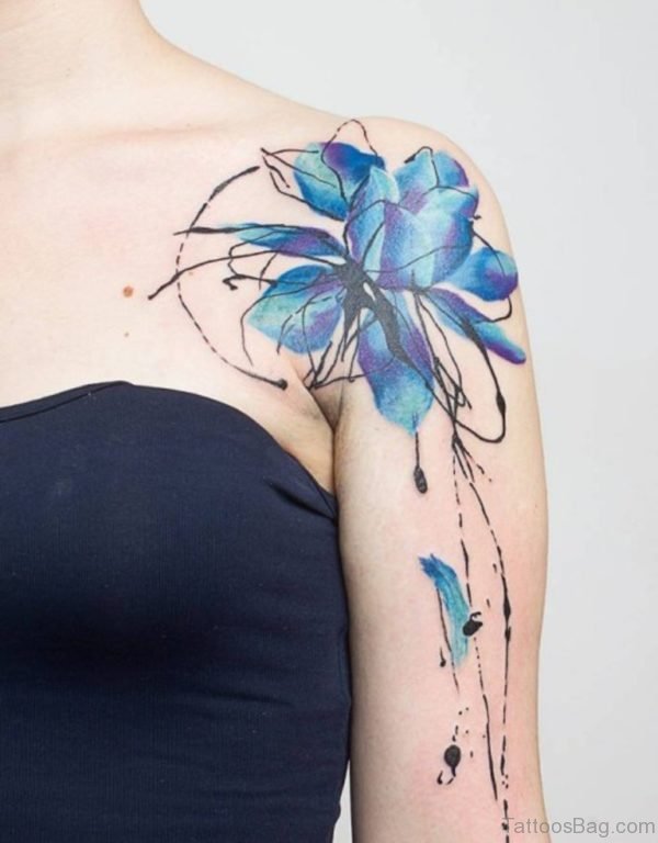 Blue Colored Tattoo On Shoulder