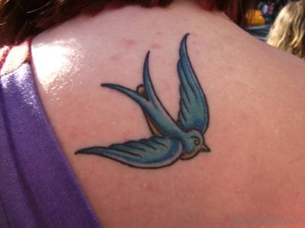 Blue Flying Bird Tattoo