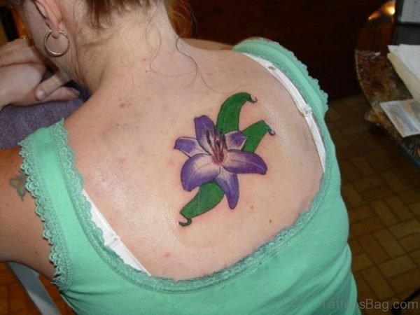Blue Lily Flower Tattoo On Back