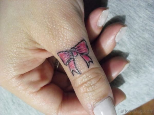Bow Tattoo On Finger