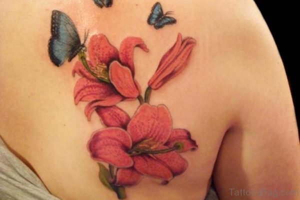 Butterfly And Lily Flower Tattoo