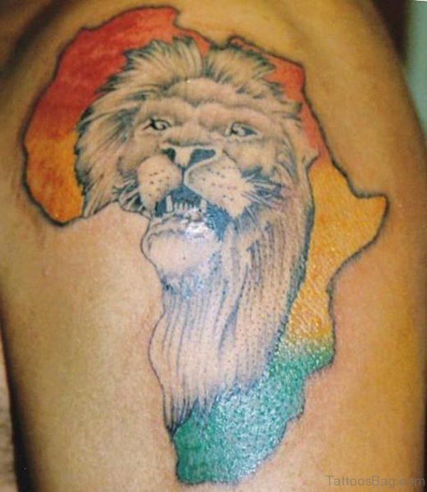 Colorful Lion Face Tattoo On Left Shoulder
