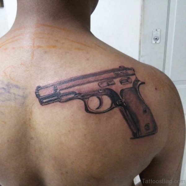 Cool Gun Tattoo On Back