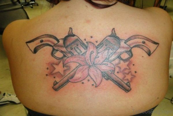 Crossed Gun Lily Flower And Star Tattoos On Back