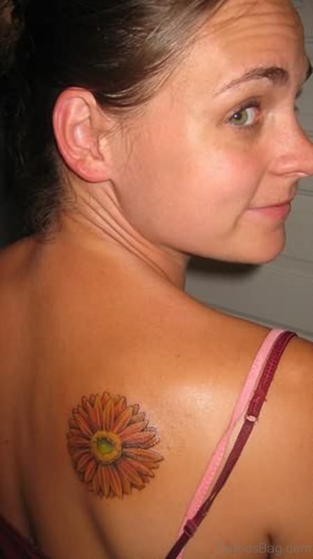 Daisy Flower Tattoo On Girl Right Back