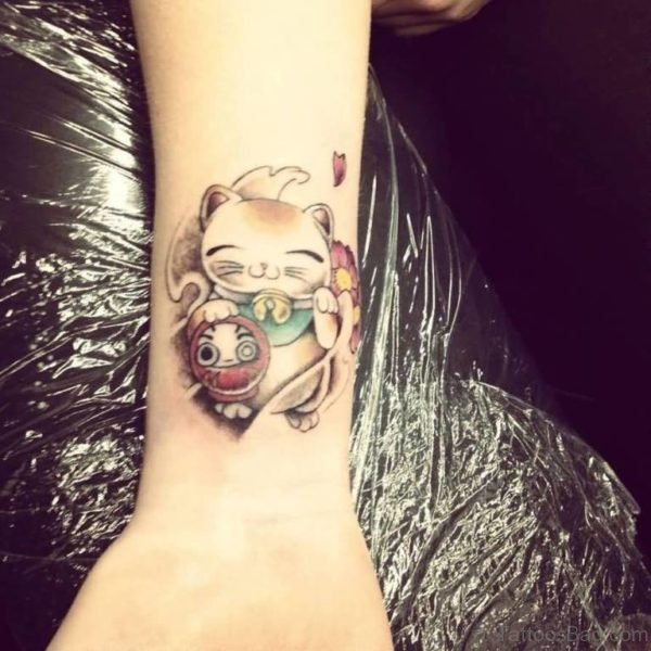 Doll And kitty Wrist Tattoo