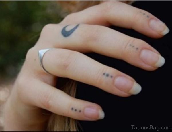 Dots Tattoo On Finger