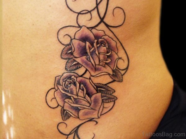Fancy Rose Tattoo On Back