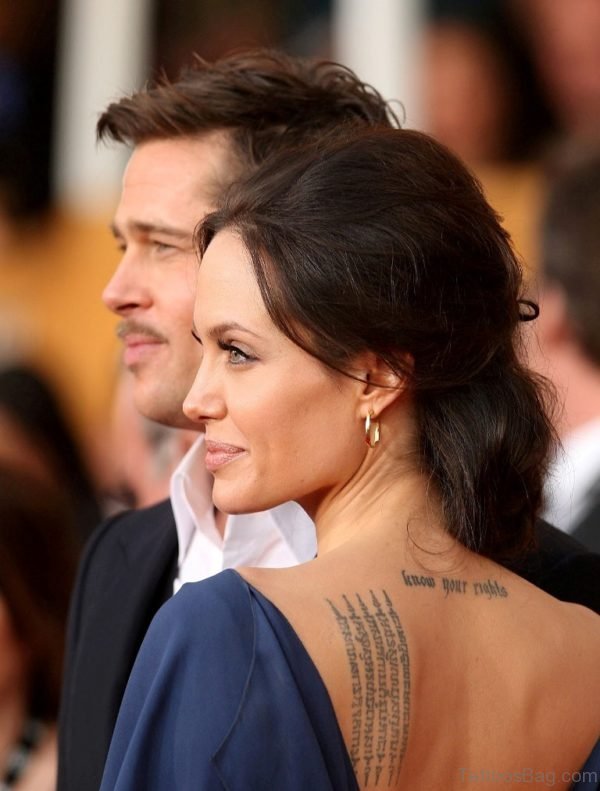 Fantastic Wording Tattoo Design On Back