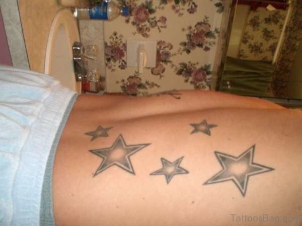 Fine Stars Tattoo On Back