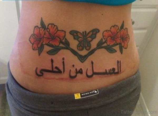 Flower And Arabic Tattoo On Lower Back