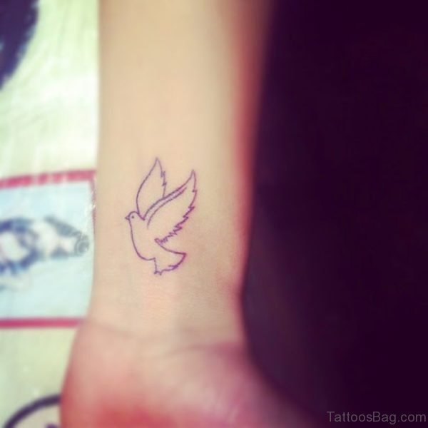 Flying Dove Tattoo On Wrist