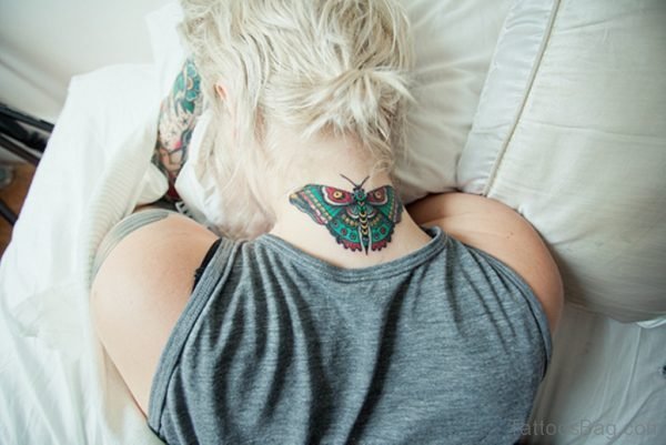Green Butterfly Tattoo On neck