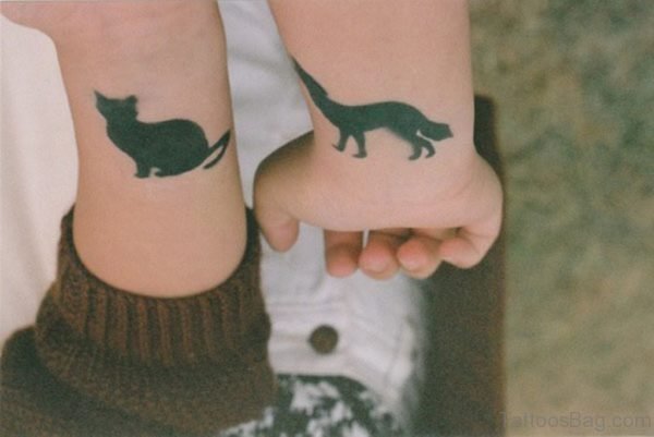 Green Tattoos On Both Hands