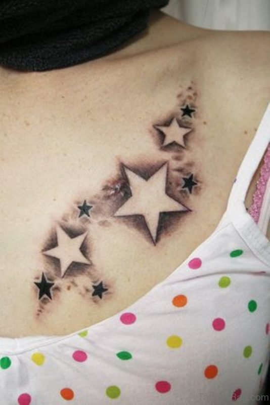 Grey And Black Star Shoulder Tattoo