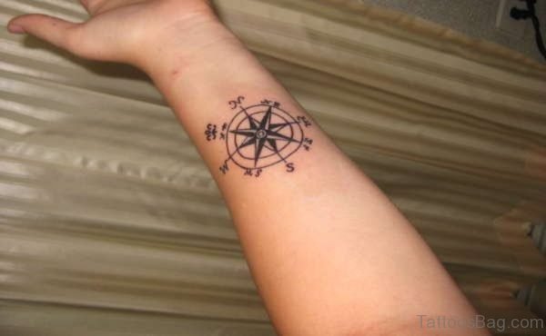 Grey Ink Compass Tattoo