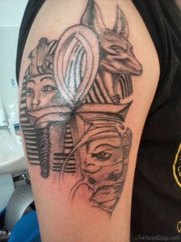 Grey Ink Egyptian Anubis Tattoo On Right Shoulder