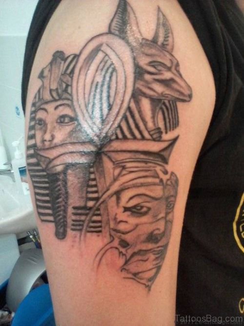 Grey Ink Egyptian Anubis Tattoo On Right Shoulder