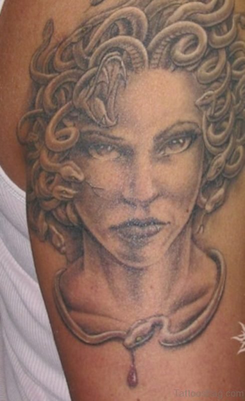 Grey Ink Medusa Face Tattoo On Right Shoulder