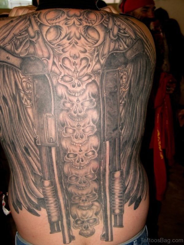 Grey Ink Winged Skulls And Guns Tattoo On Back