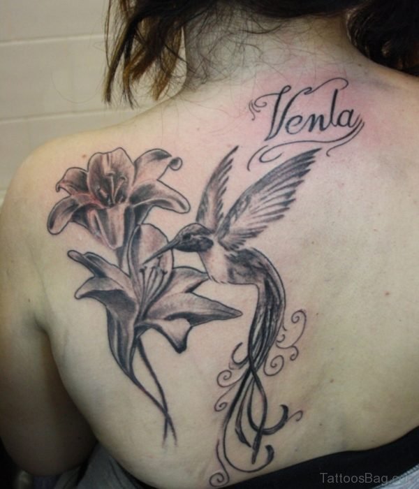 Grey Lily Flower And Hummingbird Tattoo