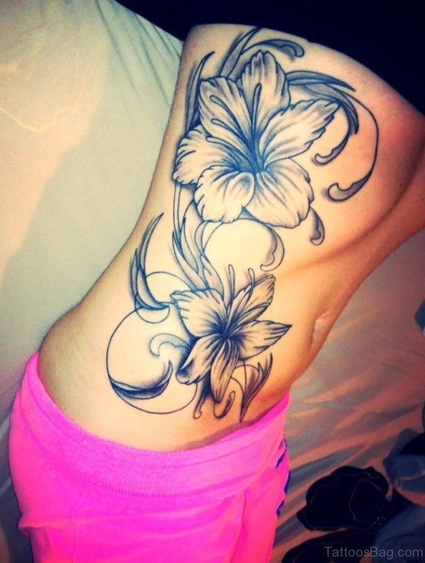 Grey Lily Tattoo On Back 