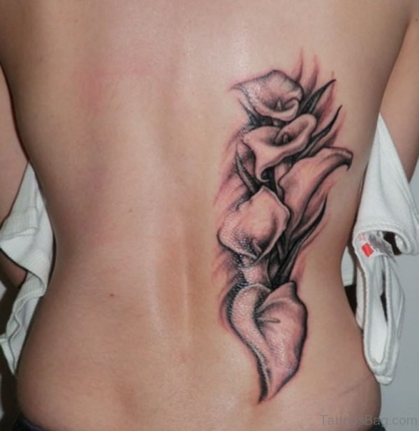 Grey Lily Tattoo On Back 