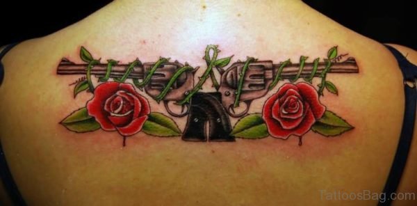 Gun And Roses Tattoo On Upper Back
