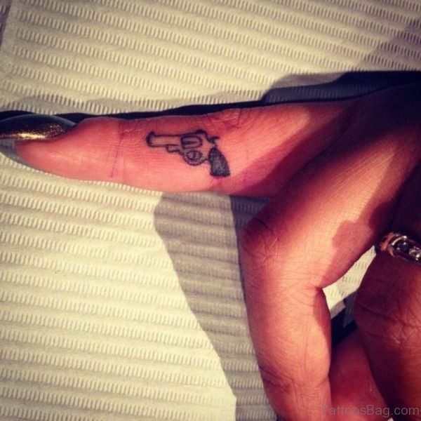 Gun Tattoo On Finger
