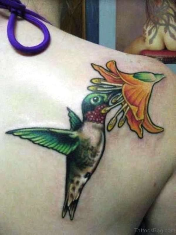 Hummingbird And Yellow Flower Tattoo